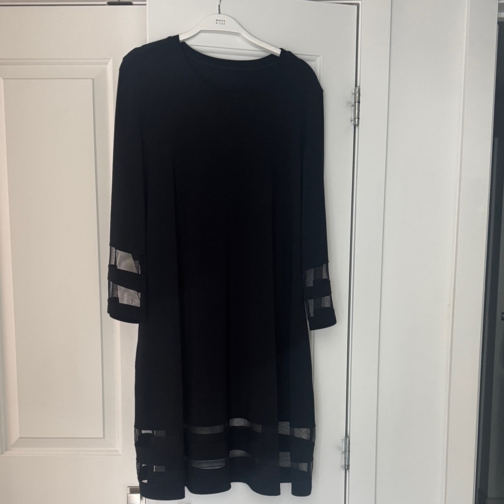 Elegant Black Dress with Sheer Accents